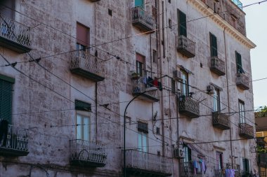 Residential buildings in Italy. On the balconies to dry things.