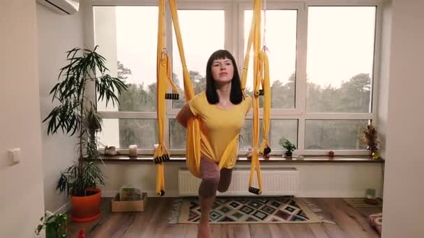 Fly Yoga Woman Doing Yoga Exercises Hammock Apartment — Stock Video