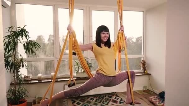 Fly Yoga Woman Doing Yoga Exercises Hammock Apartment — Stock Video