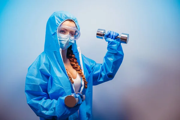 Virus Woman Medical Suit Does Exercises Dumbbell — Stock Photo, Image