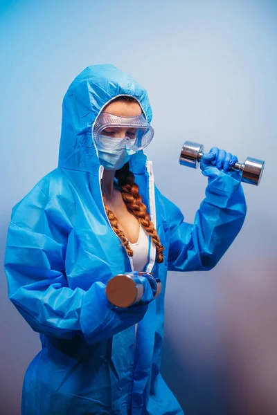 Virus Woman Medical Suit Does Exercises Dumbbell — Stock Photo, Image