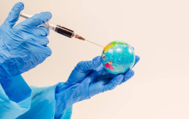 Virüs. Doktor Dünya 'ya bir iğne yapıyor..