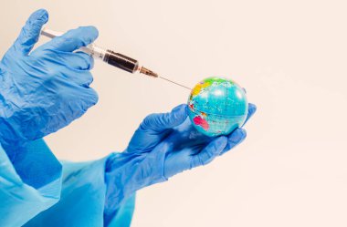 Virüs. Doktor Dünya 'ya bir iğne yapıyor..
