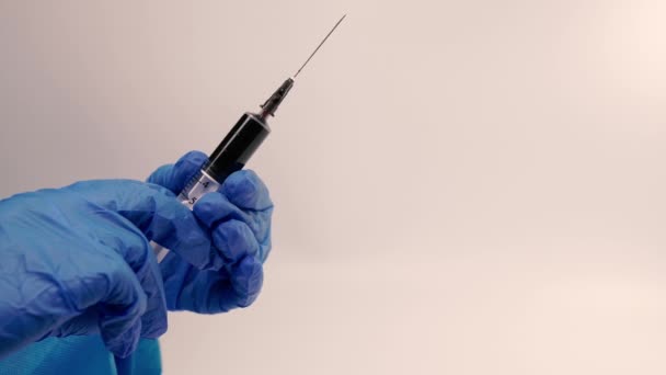 Virus Doctor Holds Syringe Filled Blood — Stock Video
