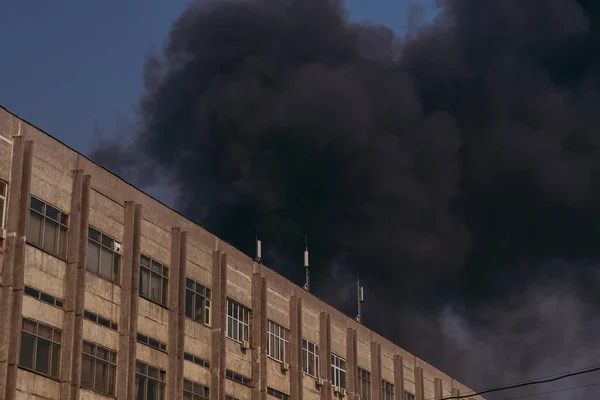 Fire. Fire at the factory. Black smoke.