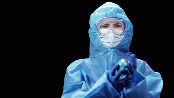 Virus Virologist Protective Antivirus Suit Throws Miniature Planet Earth — Stock Video