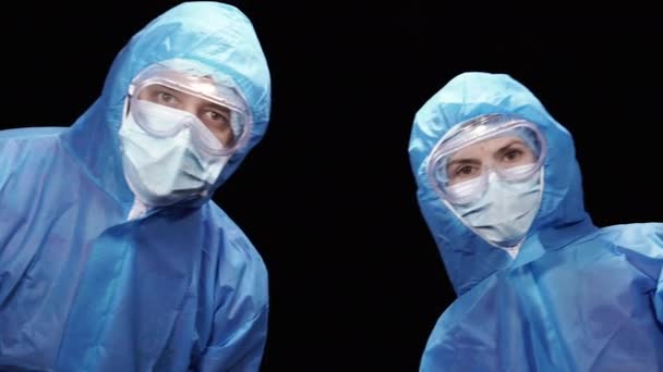 Virus Two Doctors Protective Antiviral Suit — Stock Video