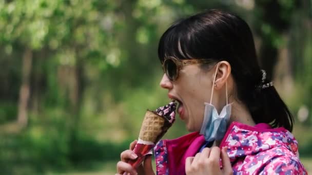 Ice Cream Woman Takes Antivirus Mask Eats Ice Cream — Stock Video