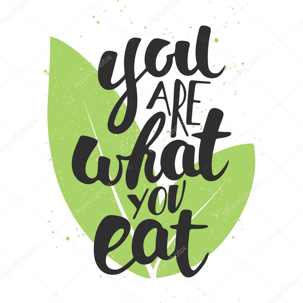 You are what you eat, modern ink brush calligraphy with leaves. 