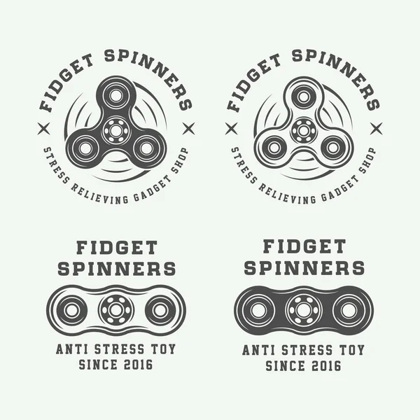 Conjunto de fidget spinners vintage logotipos, emblemas, emblemas —  Vetores de Stock