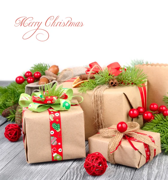 Christmas gifts on a white background with space for the text. — Stock Photo, Image