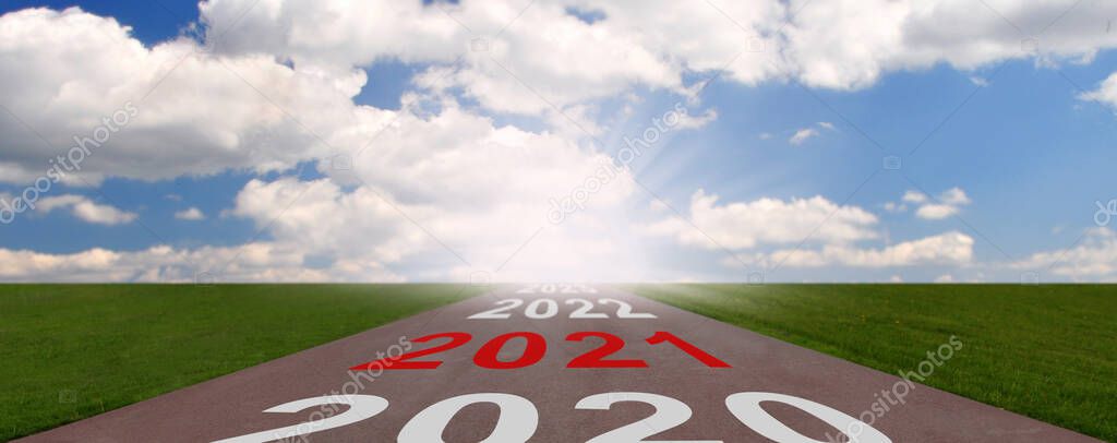 Empty asphalt road and New year 2020, 2021, 20222, 2023 concept. Concept for success and passing time.
