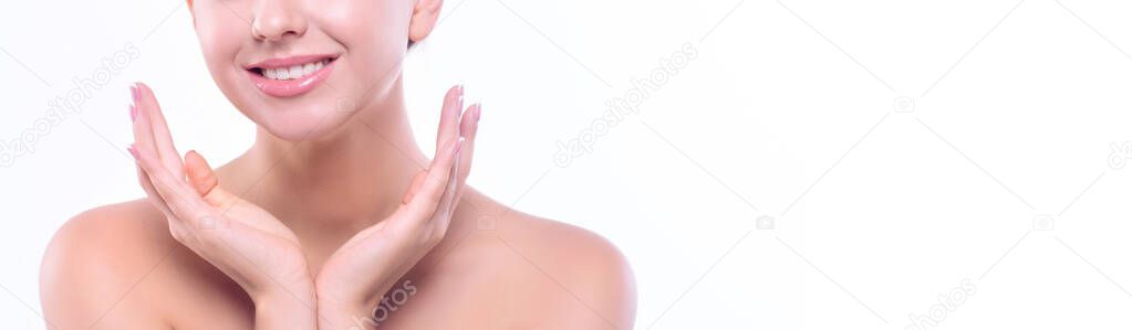 Beautiful smile, girl's hands close-up on a white background