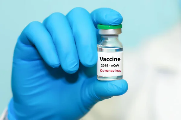 Ein Arzt Hält Einen Coronavirus Impfstoff Der Hand Das Konzept — Stockfoto