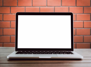 Montaj grafikleri görüntülemek için tabloda oda ofis, orada laptop brick kırmızı bir arka plan olduğunu. Senin ekran reklam koymak için almak.