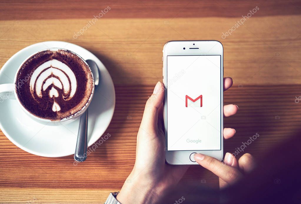 Bangkok, Thailand - August 22, 2017 :  Apple iPhone 6 with Google Gmail app logo on the display. Gmail is a most popular free Internet e-mail service provided by Google.