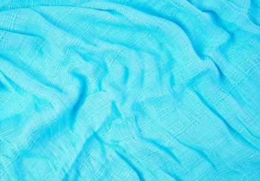 Eşarp mavi kumaş. Işık ve gölge bir dalga göstermeleridir. İçin arka planda olmak.