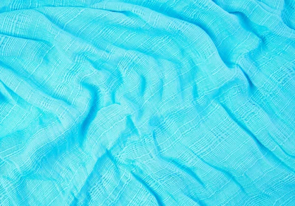 Eşarp mavi kumaş. Işık ve gölge bir dalga göstermeleridir. İçin arka planda olmak.