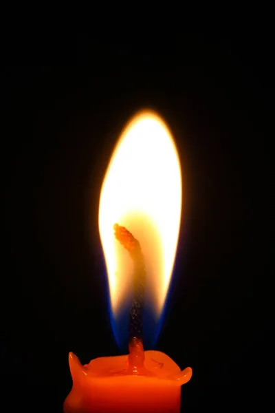 Candle flame  black background . — Stock Photo, Image