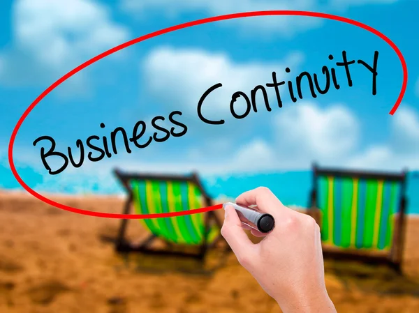 Man Hand writing Business Continuity with black marker on visual — Stock Photo, Image