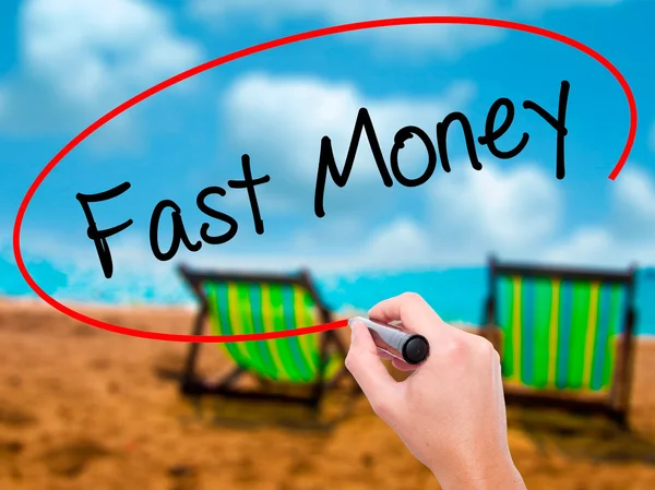 Az ember kezét Fast Money írásban vizuális képernyő marker fekete — Stock Fotó