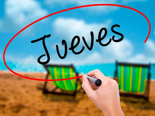 Man Hand writing Jueves (quinta-feira em espanhol) com marcador preto — Fotografia de Stock