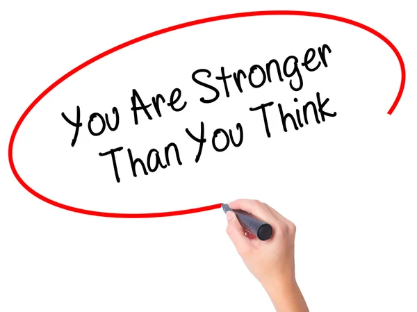 Mujer Hand writing You Are Stronger Than You Think with black ma — Foto de Stock