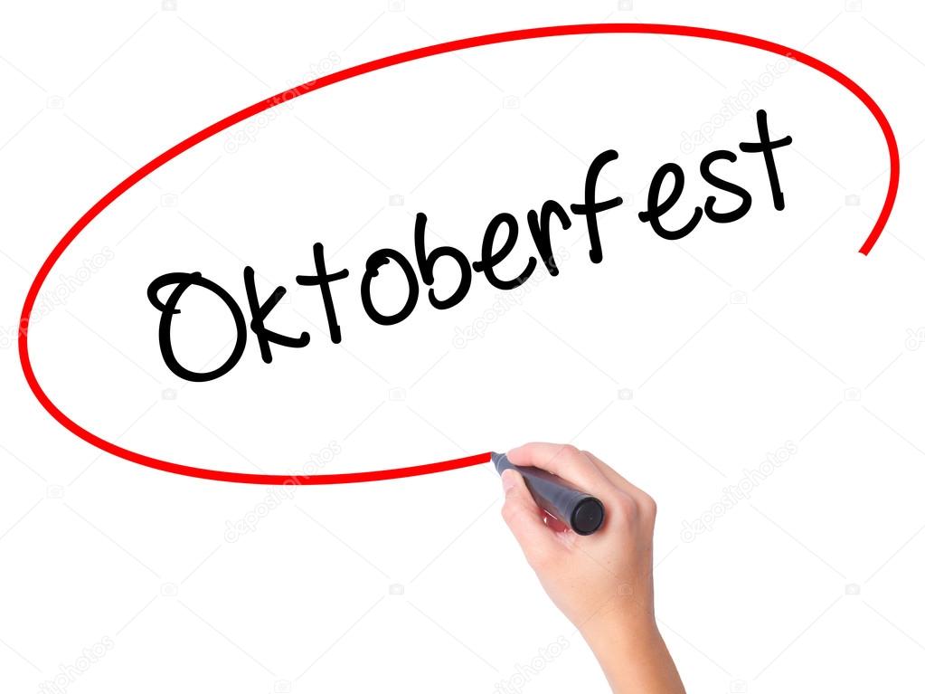 Women Hand writing Oktoberfest with black marker on visual scree