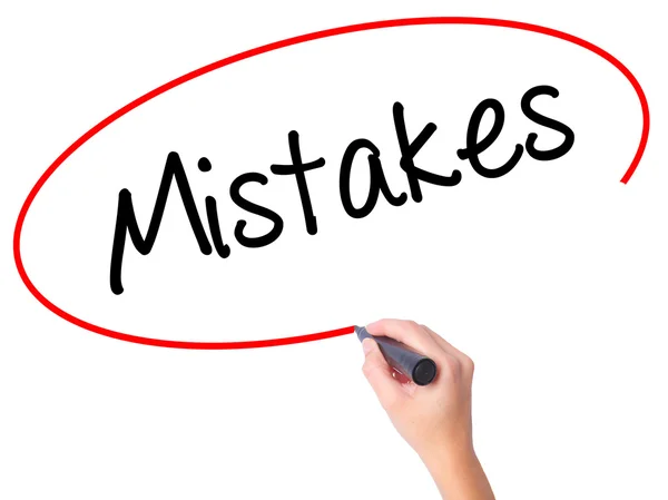 Women Hand writing  Mistakes with black marker on visual screen — Stock Photo, Image