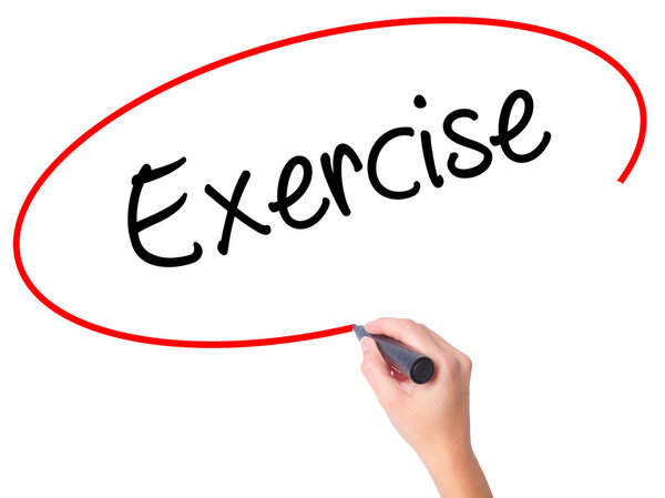 Women Hand writing Exercise with black marker on visual screen.