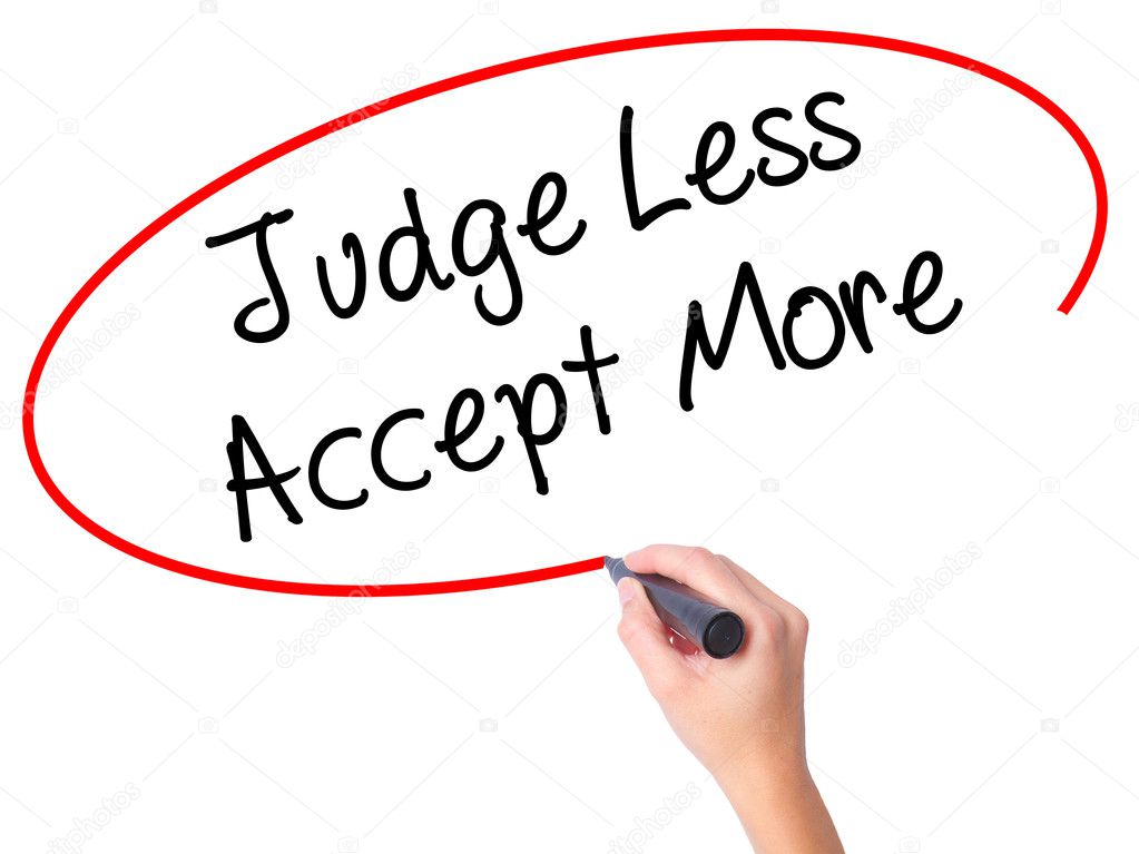 Women Hand writing Judge Less Accept More with black marker on v