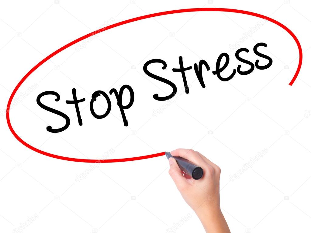 Women Hand writing Stop Stress with black marker on visual scree