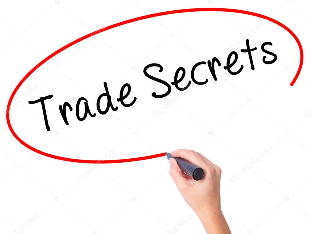 Women Hand writing Trade Secrets with black marker on visual scr