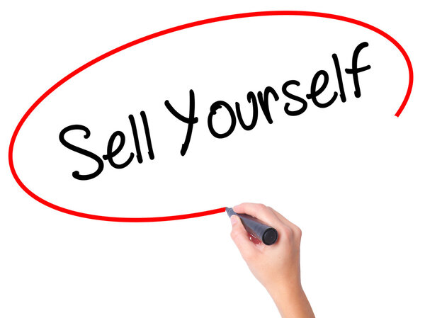 Women Hand writing Sell Yourself with black marker on visual scr
