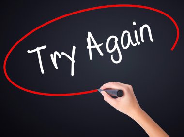 Kadın el yazma deneyin yine şeffaf domuz üzerinde bir marker ile