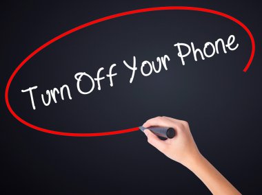 Woman Hand Writing Turn Off Your Phone with a marker over transp clipart
