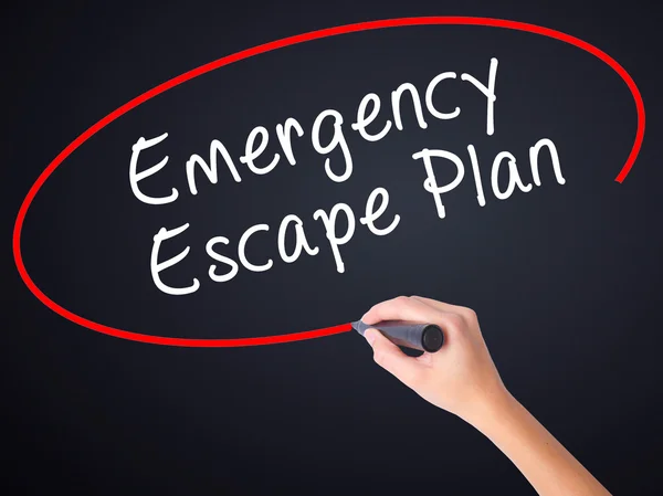 Woman Hand Writing Emergency Escape Plan with a marker over tran — Stock Photo, Image
