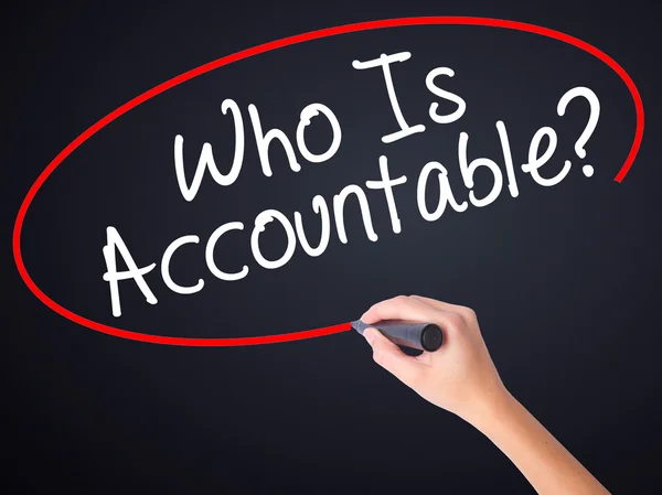 Woman Hand Writing Who Is Accountable? with a marker over transp — Stock Photo, Image