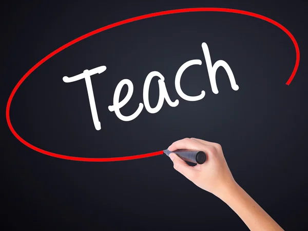 Woman Hand Writing Teach with a marker over transparent board . — Stock Photo, Image