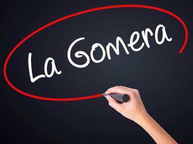 Kadın el yazma La Gomera şeffaf domuz üzerinde bir marker ile