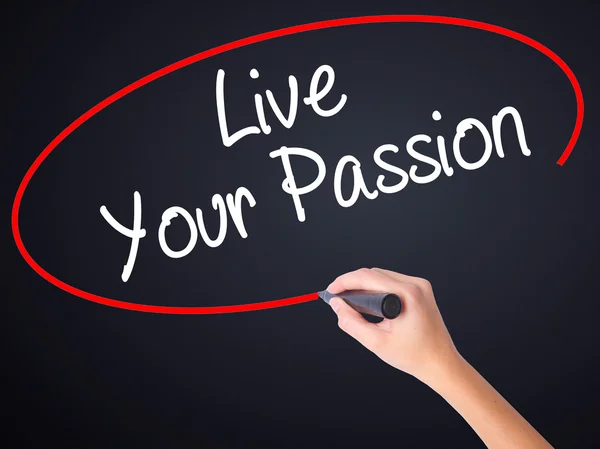 Woman Hand Writing  Live Your Passion with a marker over transpa