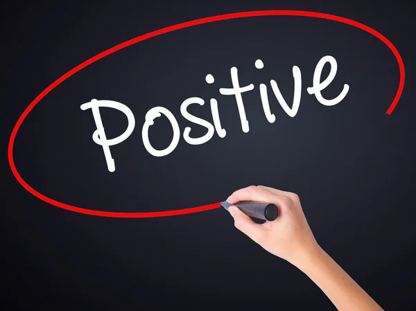 Woman Hand Writing Positive with a marker over transparent board — Stock Photo, Image