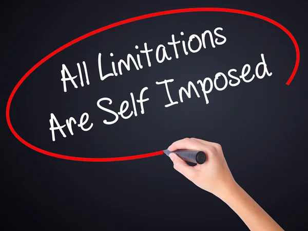 stock image Woman Hand Writing All Limitations Are Self Imposed with a marke