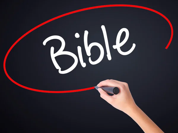 Woman Hand Writing Bible with a marker over transparent board — Stock Photo, Image