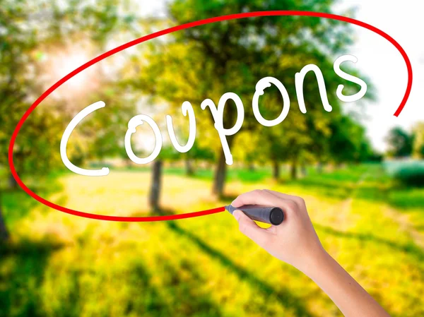 Woman Hand Writing Coupons black marker on visual screen — Stock Photo, Image