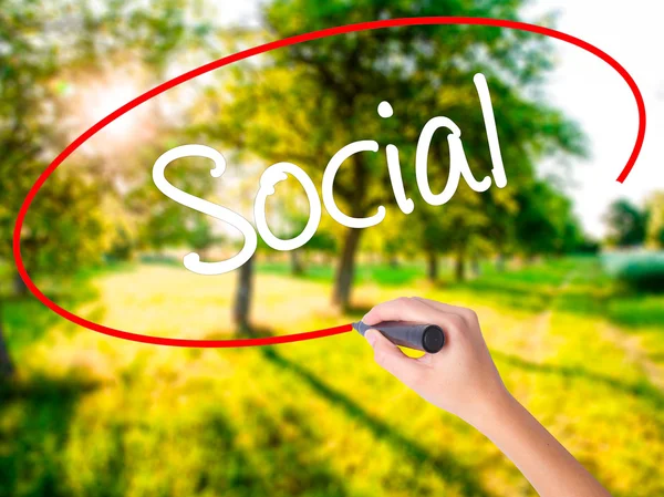 Woman Hand Writing Social with a marker over transparent board — Stock Photo, Image