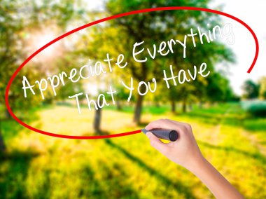 Woman Hand Writing Appreciate Everything That You Have with a ma clipart
