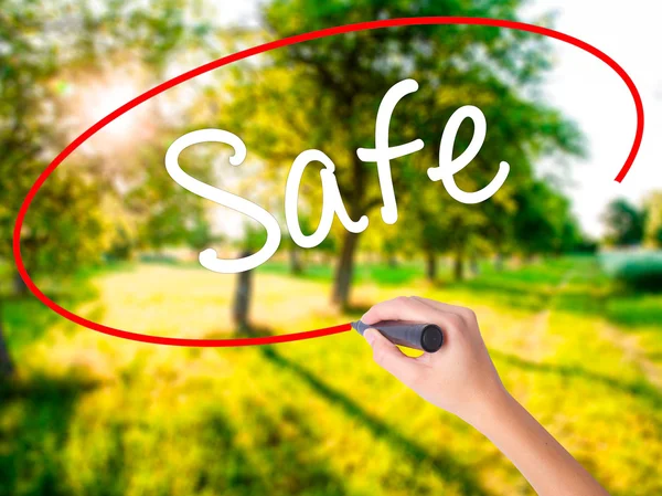 Woman Hand Writing Safe with a marker over transparent board — Stock Photo, Image