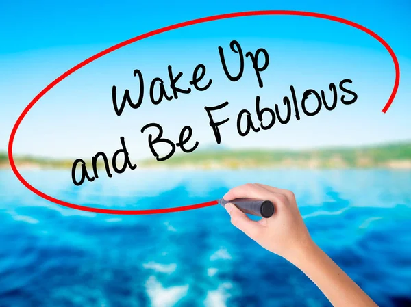Woman Hand Writing Wake Up and Be Fabulous with a marker over tr — Stock Photo, Image