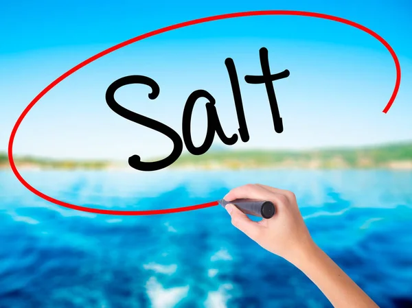 Woman Hand Writing Salt with a marker over transparent board — Stock Photo, Image